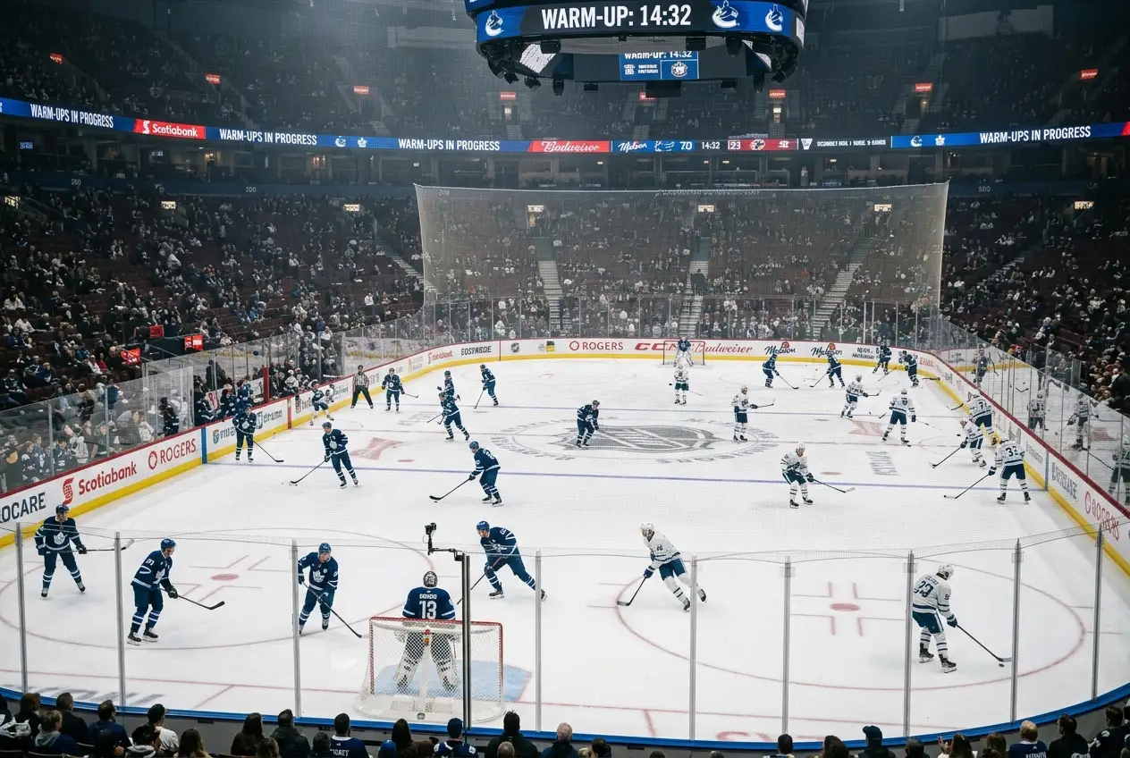 Multiple NHL arenas symbolised by a wide ice surface during a busy night
