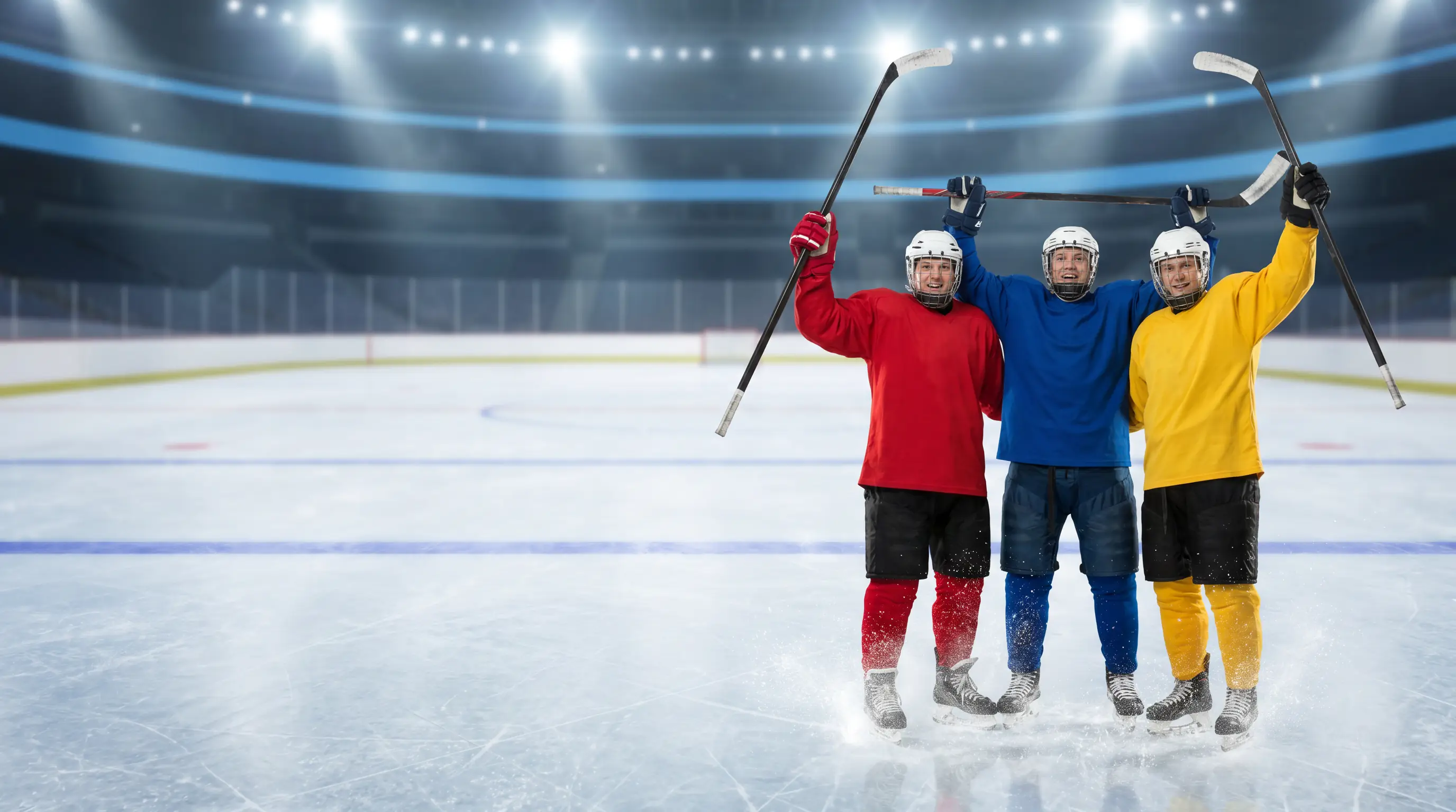 National team players raising sticks after an IIHF World Championship goal