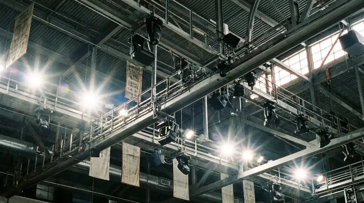 NHL EDGE infrared tracking cameras mounted on the rafters of a North American ice hockey arena