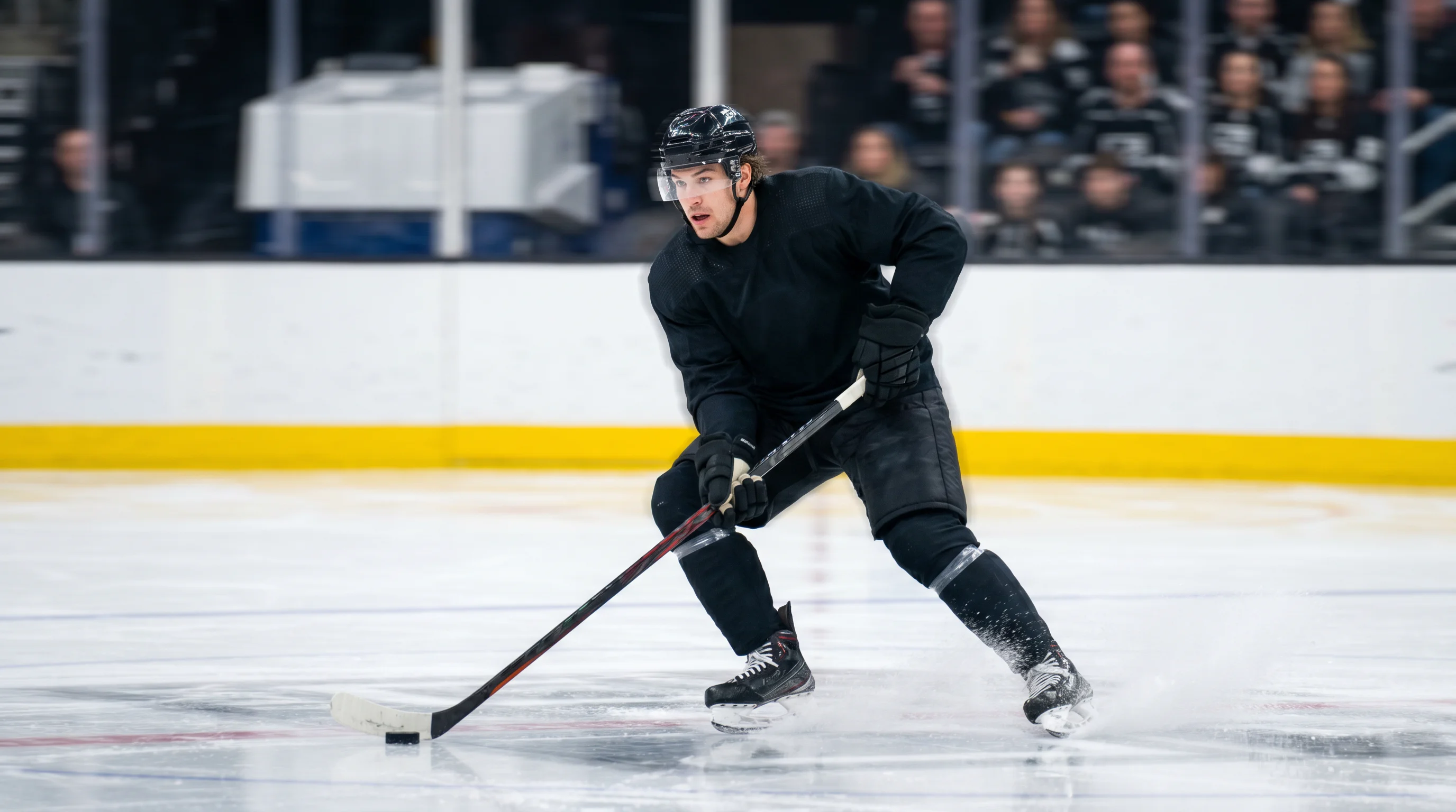 NHL forward in full stride during a high-speed transition rush