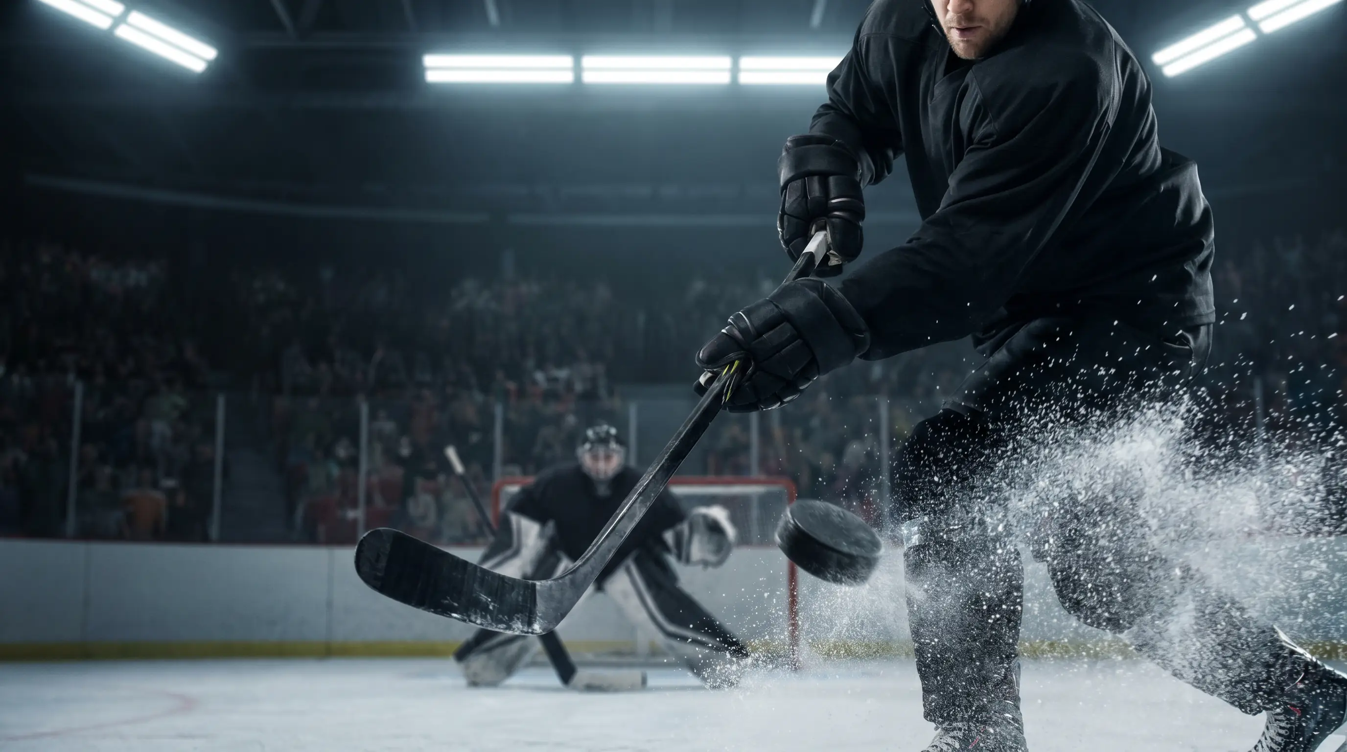NHL forward releasing a wrist shot from the slot