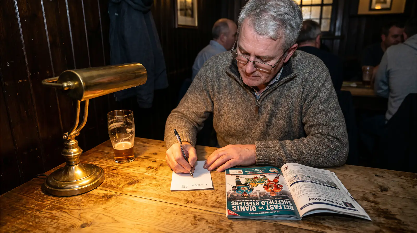 UK punter writing out a Lucky 15 accumulator slip by hand